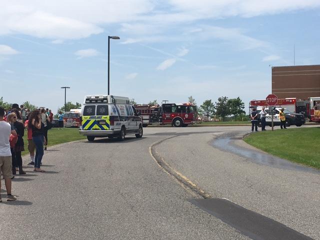 Emergency personnel line up at the scene of a fire at North Penn High School on Tuesday, May 24. NPSD announced today that a student has been arrested in connection with the fire.