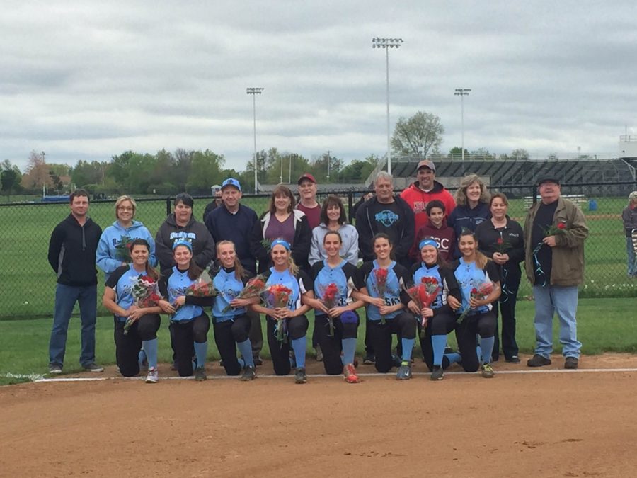 Prior to the start of the game, the North Penn softball seniors were honored with a ceremony.  Each was escorted by their parents, who are shown above. 
Seniors FRONT L to R: Jovanna Alfonsi, Katie Beer, Kate Knab, Melanie Lauro, Ashley Puia, Julia Puia, Haley Weber, Liz Williams.