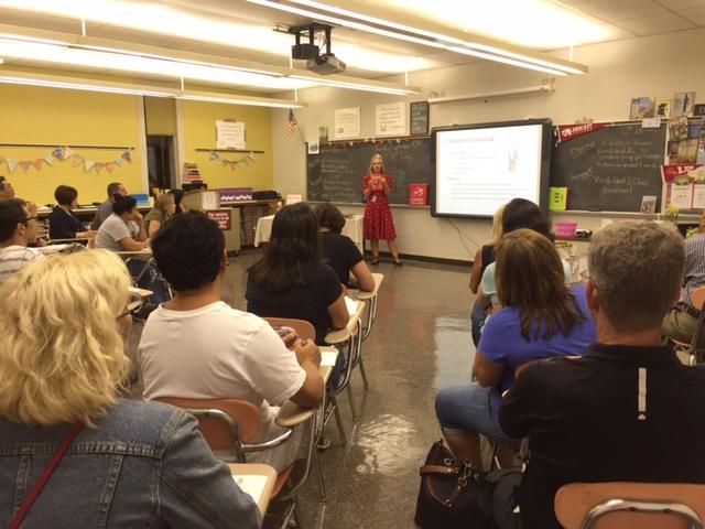 Sitting in on their childs classes, parents receive the opportunity to meet their teachers and familiarize themselves with their schedule.