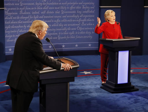 Republican presidential nominee Donald Trump and Democratic presidential nominee Hillary Clinton speak at the same time during the presidential debate at Hofstra University in Hempstead, N.Y., Monday, Sept. 26, 2016. (Rick T. Wilking/Pool via AP)