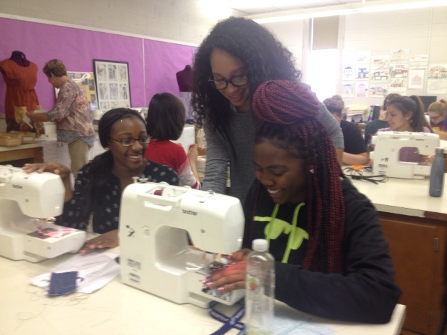 NPHS students Cameryn Myrie, Cenna Crosby, and Katiana Dupiche work on a project in their Advanced Clothing Textiles and Merchandising class. There are no male students currently enrolled in this class. 