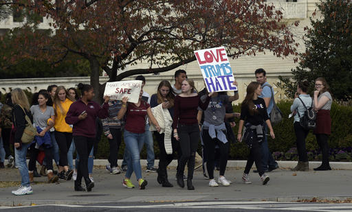 Washington area high school students protest near the Supreme Court in Washington, Tuesday, Nov. 15, 2016. Hundreds of demonstrators are gathered outside the Supreme Court to protest Donald Trump’s election. They are mostly young people who appear to have walked out of school to protest. (AP Photo/Susan Walsh)