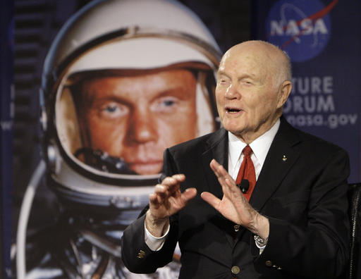 FILE - In this Feb. 20, 2012, file photo, U.S. Sen. John Glenn talks with astronauts on the International Space Station via satellite before a discussion titled Learning from the Past to Innovate for the Future in Columbus, Ohio. Glenn, who was the first U.S. astronaut to orbit Earth and later spent 24 years representing Ohio in the Senate, has died at 95. (AP Photo/Jay LaPrete, File)