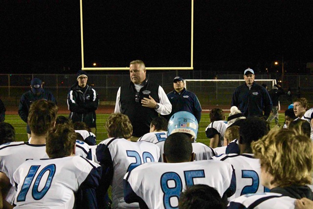 After the Hawks (13-0) clinched a 35-25 victory against the Knights (14-1), Head Coach Dick Beck and his team had a post-game talk.
