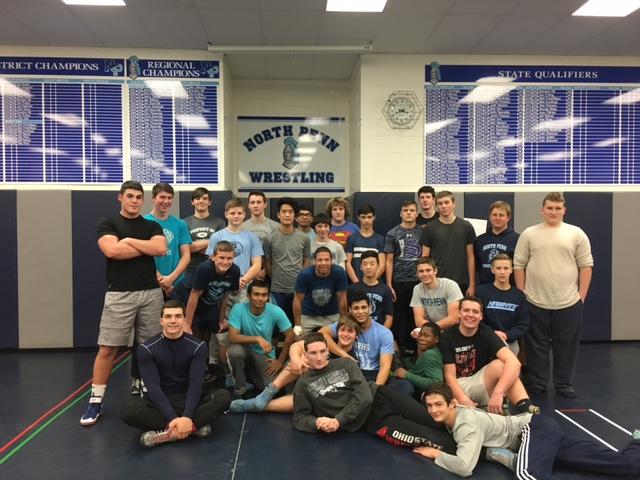 The Boys Wrestling team posing for a photo.