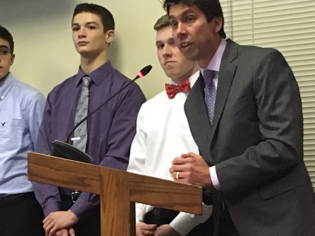 Mr. Michael Boyer introduces his three teams of students from the Engineering Design and Development course before they each presented their research to the Board. 