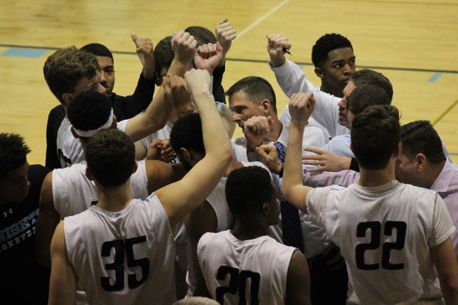 North+Penn+huddles+during+a+timeout