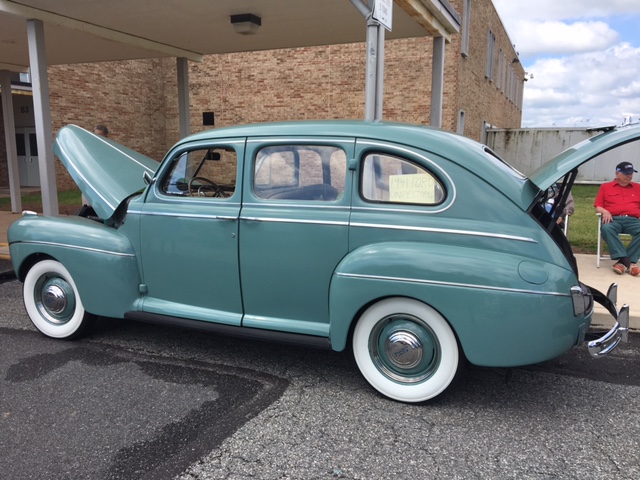 North Penn community member and auto technician Louis Steiskal shows off his 1941 Unrestored Ford at the 20th annual NP Auto Show.