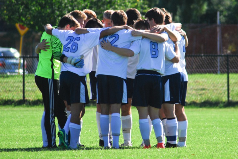 Knights huddle during the game