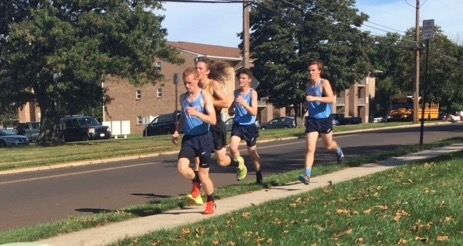 Central Bucks West runner challenging North Penn pack.