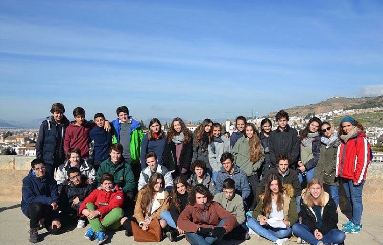 Kaitlyn+Van+Dame+pictured+bottom+right+with+her+former+classmates+in+Spain.+%28Submitted+Photo%29