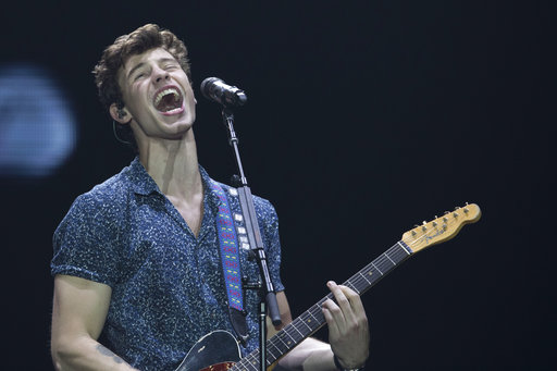 FILE - In this Sept. 16, 2017, file photo, Canadian singer Shawn Mendes performs at the Rock in Rio music festival in Rio de Janeiro, Brazil. Mendes announced on Sept. 22, 2017, that he was launching an online fundraiser to help those affected by the Sept. 19 earthquake in Mexico. (AP Photo/Leo Correa, File)