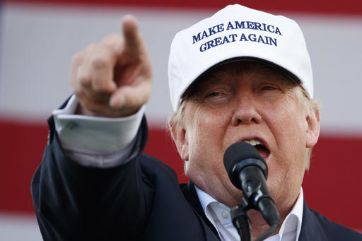 FILE - In this Wednesday, Nov. 2, 2016 file photo, Republican presidential candidate Donald Trump speaks during a campaign rally in Miami. Outraged claims of voting fraud are no longer only a regular part of elections in unsteady, young democracies - they’re increasingly being made in established democratic countries by populist politicians who question the fairness of the voting process - and with it the validity of representation by and for the people. At the final debate of the U.S. presidential election, Donald Trump refused to commit to honor the result of the Nov. 8 vote. But he’s not the only example of a politician casting doubt on the fairness of the democratic system in countries where it is the norm. (AP Photo/ Evan Vucci, file)