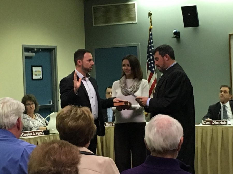 NP School Board swears in new members: Christian Fusco recites the Oath of Office as he is sworn in as a Board member.