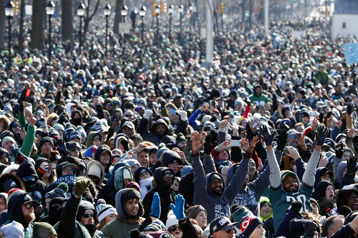Fans cheer as they watch a replay of Super Bowl 52 in front of the the Philadelphia Museum of Art before a Super Bowl victory parade for the Philadelphia Eagles football team, Thursday, Feb. 8, 2018, in Philadelphia. The Eagles beat the New England Patriots 41-33 in Super Bowl 52. (AP Photo/Alex Brandon)