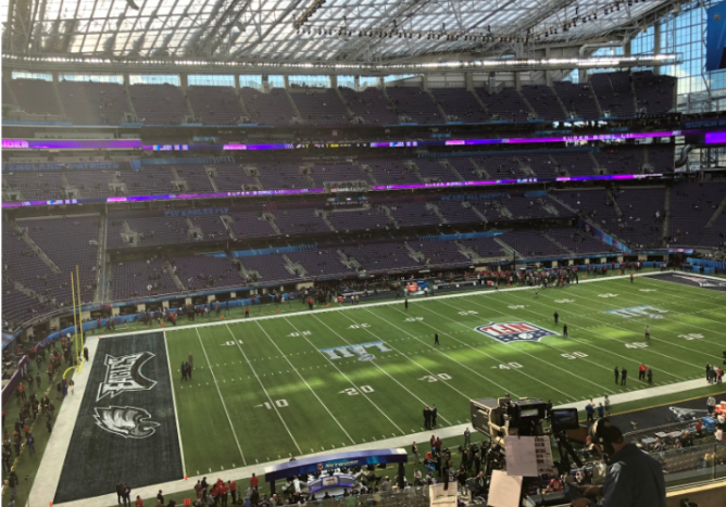 SUPER BOWL- Knight Crier staff writer Andrew Helt snaps a picture at his seat during Super Bowl Lll.