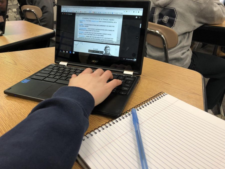 Chrome+v.+Pen%3A+A+North+Penn+High+School+student+scrolls+through+an+English+class+power+point+on+Moby-Dick.+With+an+increase+in+technology+in+the+classroom+comes+a+decrease+in+hand+written+note+taking.+Whether+that+change+is+for+better+or+worse+is+up+for+debate+among+educators.+