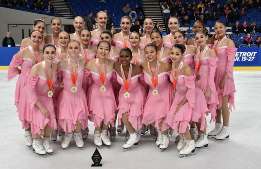 Sarah Yang and her team, the Skyliners, pose for a picture at the 2018 U.S Synchronized Skating Championship.