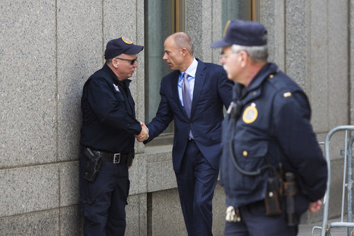 Attorney Michael Avenatti, who is representing Stormy Daniels, arrives at federal court on Friday, April 13, 2018, in New York.  A  hearing has been scheduled before U.S. District Judge Kimba Wood to address President Donald Trumps personal attorney, Michael Cohens request for a temporary restraining order related to the judicial warrant that authorized a search of his Manhattan office, apartment and hotel room this week. (AP Photo/Kevin Hagen)