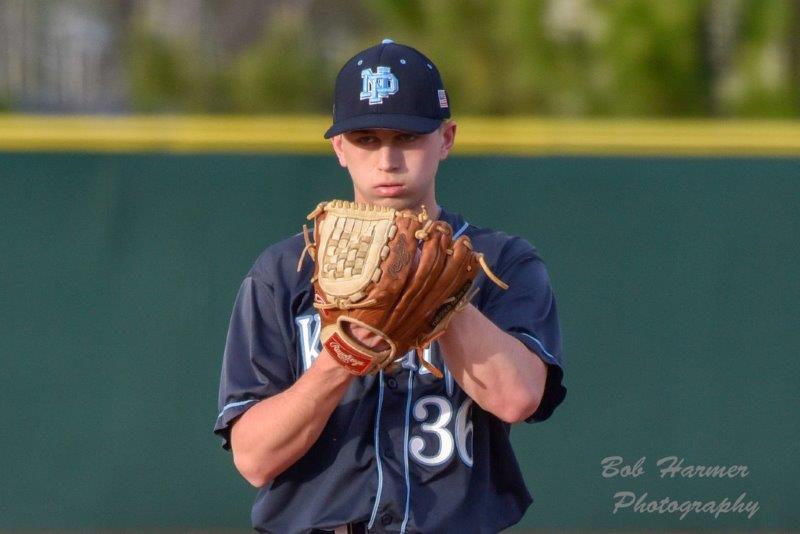 Mason Blankenburg gets his sign from the catcher in an early season baseball game this spring at the Ripken Baseball Complex in Myrtle Beach, SC. The senior LHP will play in college next year, but his road to this point has been anything but conventional. 