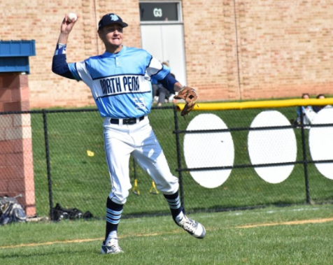 BASEBALL- Third baseman senior Tyler Siddal throws to first baseman Billy Collins for an out.