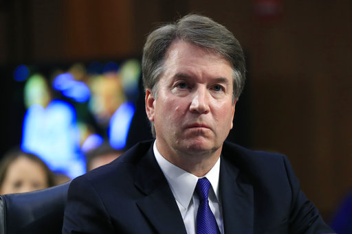 FILE - In this Sept. 4, 2018 photo, Supreme Court nominee Brett Kavanaugh, listens to Sen. Cory Booker, D-N.J. speak during a Senate Judiciary Committee nominations hearing on Capitol Hill in Washington. FBI agents interviewed one of the three women who have accused Kavanaugh of sexual misconduct as Republicans and Democrats quarreled over whether the bureau would have enough time and freedom to conduct a thorough investigation before a high-stakes vote on his nomination to the nations highest court. (AP Photo/Manuel Balce Ceneta, File)