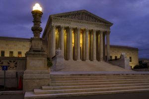The U. S. Supreme Court building stands quietly before dawn in Washington, Friday, Oct. 5, 2018. The U.S. Senate will start the process of voting on Brett Kavanaughs confirmation as a Supreme Court Associate Justice today. (AP Photo/J. David Ake)