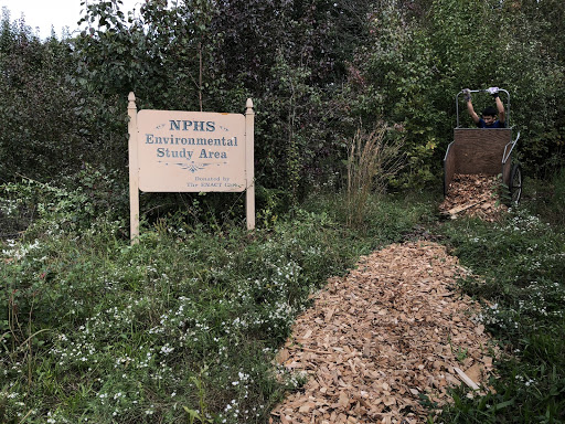 HIT THE TRAILS: The entrance to the NPHS Environmental Study Area, where the Enact Club began working on a trail during the 2017-18 school year. 