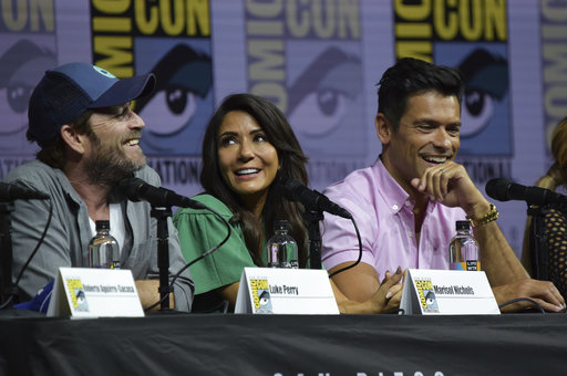 Luke Perry, from left, Marisol Nichols, and Mark Consuelos participate in the Riverdale panel on Day 4 of Comic-Con International on Sunday, July 22, 2018, in San Diego. (Photo by Richard Shotwell/Invision/AP)