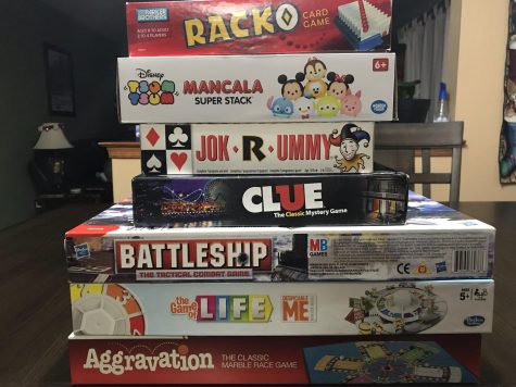 A stack of Brandi Marlins most frustrating board games. 