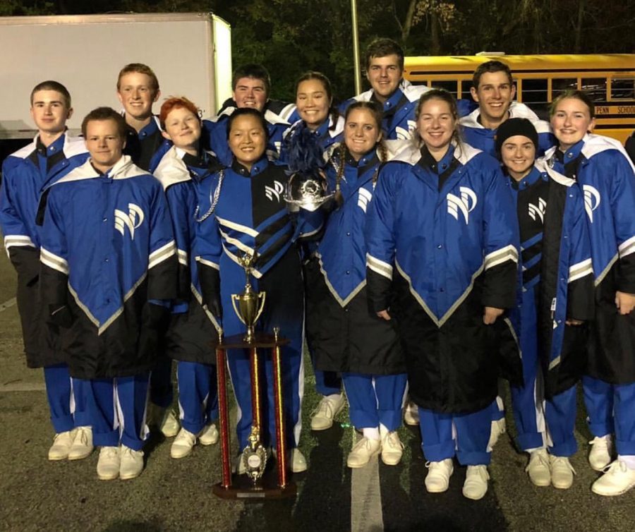 The Marching Knights pose for a picture after winning the state championship.