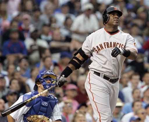 San Francisco Giants Barry Bonds watches his home run during the second inning of a baseball game against the Chicago Cubs Thursday, July 19, 2007 in Chicago. It was his 752nd career home run.  (AP Photo/M. Spencer Green)