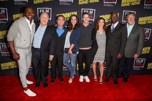 Terry Crews, from left, Dirk Blocker, Joe Lo Truglio, Melissa Fumero, Andy Samberg, Chelsea Peretti, Andre Braugher and Joel McKinnon Miller arrive at An Evening With Brooklyn Nine-Nine at Bing Theatre on Thursday, May 7, 2015, in Los Angeles. (Photo by Rich Fury/Invision/AP)