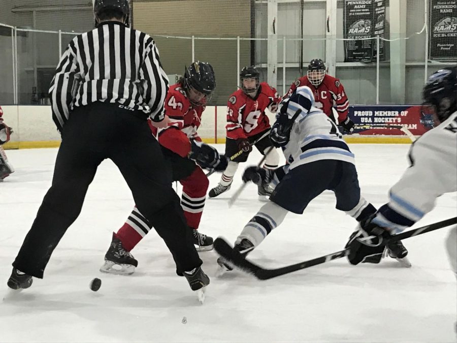 Tyler Greenstein battles for a face off win in the midst of 1 of the 4 power plays for the Knights 