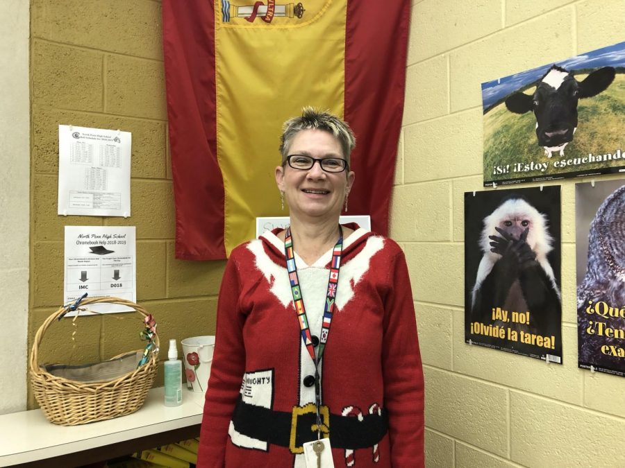 Sra Kriebel in front of her Spanish flag. 