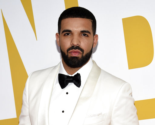 FILE - In this June 26, 2017 file photo, Canadian rapper Drake arrives at the NBA Awards in New York. Drakes song In My Feelings,  was named as one of the top songs of the year by Associated Press Music Editor Mesfin Fekadu. (Photo by Evan Agostini/Invision/AP, File)