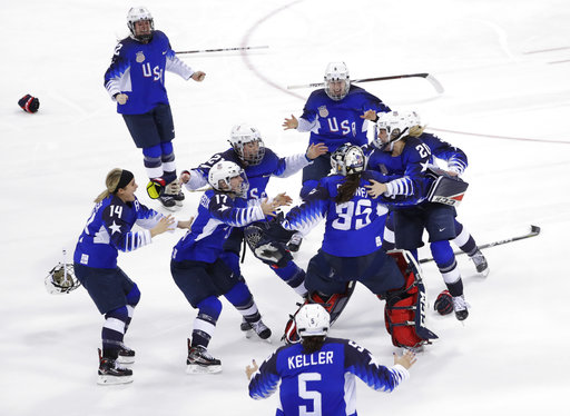 United States celebrates winning gold in the womens gold medal hockey game against Canada at the 2018 Winter Olympics in Gangneung, South Korea, Thursday, Feb. 22, 2018. (AP Photo/Matt Slocum)
