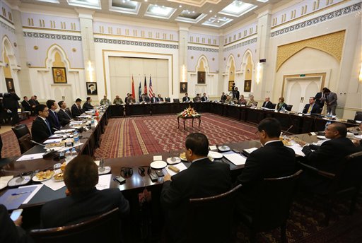 Delegations from Afghanistan, Pakistan, The United States of America and China discuss a road map for ending the war with the Taliban at the Presidential Palace in Kabul, Afghanistan, Tuesday, Feb. 23, 2016. An Afghan official says talks in Kabul between representatives of four countries trying to end Afghanistans war with the Taliban are likely to set a date for a face-to-face meeting between the two sides. (AP Photo/Rahmat Gul)