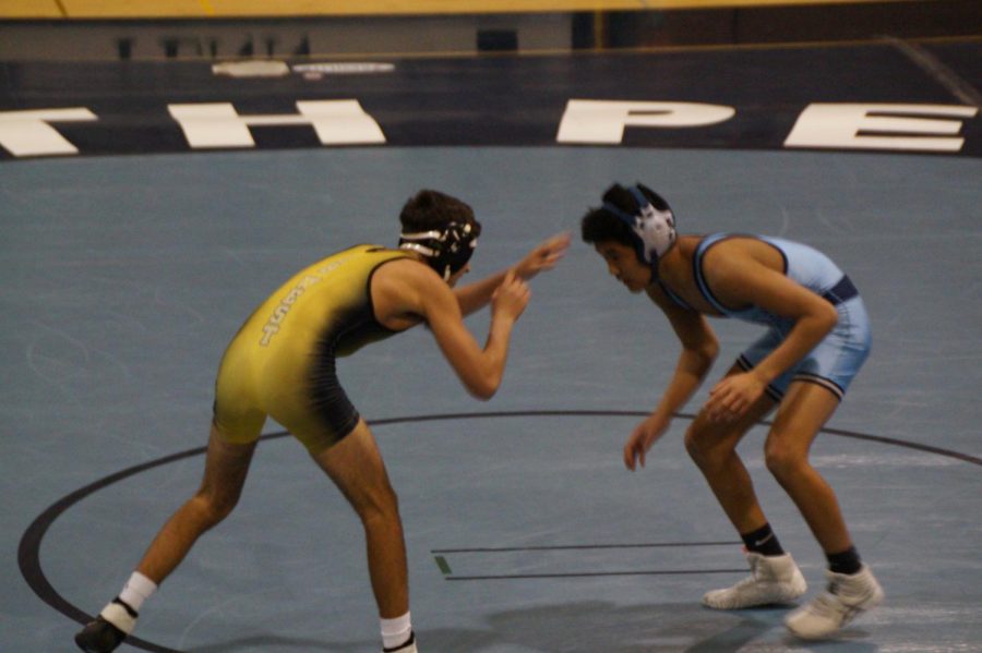 Sophomore Eddie Galang vs. senior Jake Tosti in the 120-pound weight class.  Galang won by a 2-0 decision.