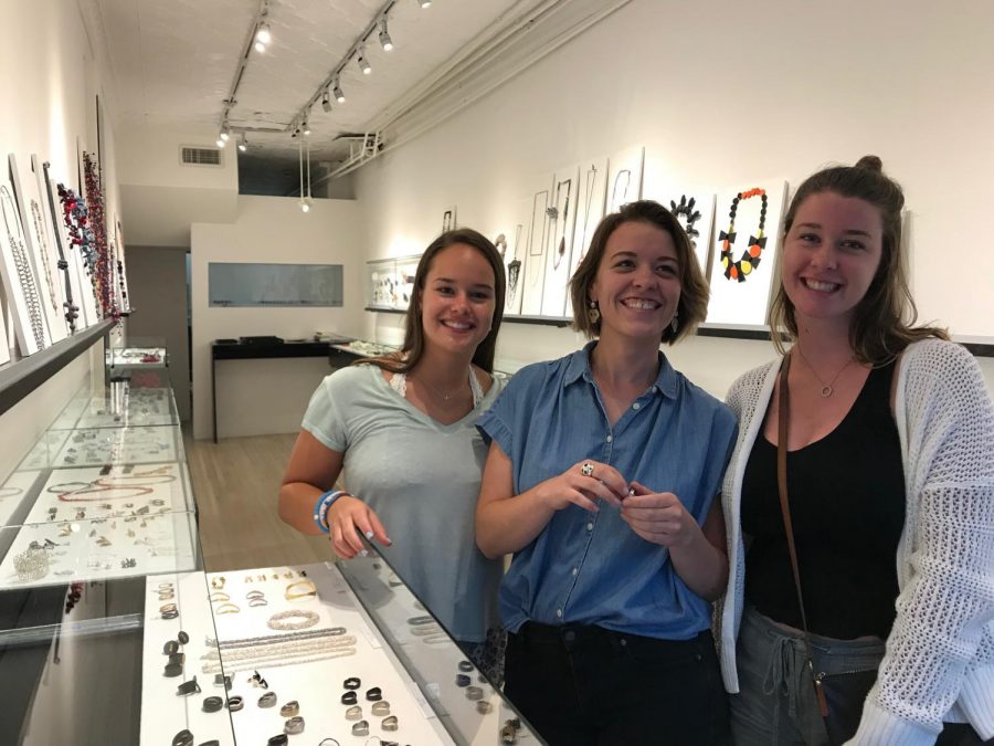 Valerie James (middle) with her two younger sisters Diana and Kirsten at a jewelry gallery.