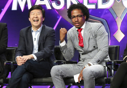 Ken Jeong, left, and Nick Cannon participate in The Masked Singer panel during the Fox Television Critics Association Summer Press Tour at The Beverly Hilton hotel on Thursday, Aug. 2, 2018, in Beverly Hills, Calif. (Photo by Willy Sanjuan/Invision/AP)