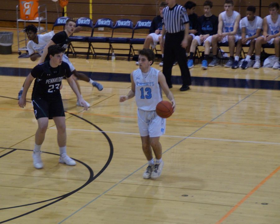 Senior Chris Caputo drops 20 points for the Knights.