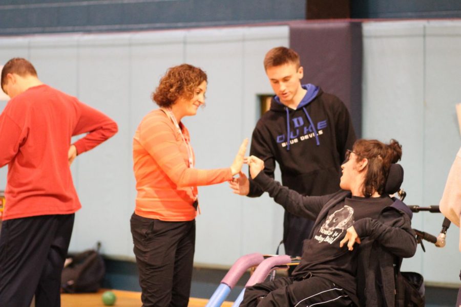 As one of the coaches for the Unified Bocce team, NPHS Health and PE teacher Kristen Panaski loves the interactions between the team.