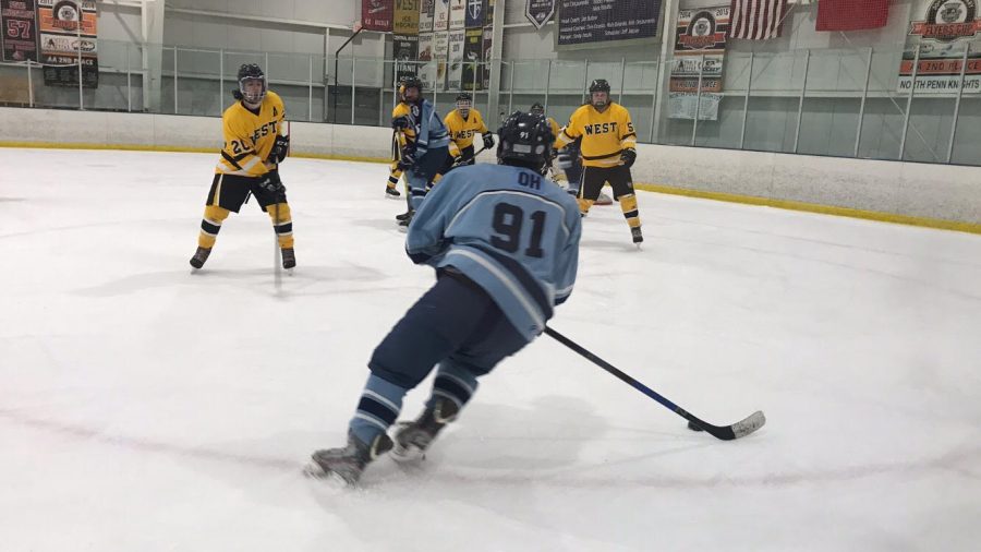 Senior Nate Oh takes a pass and looks to shoot at the net. 