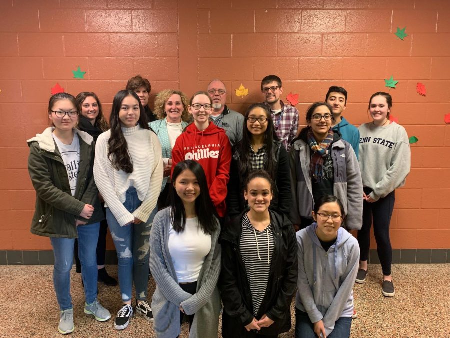Members of the Enact Club pose for a picture after their meeting with North Penn administration about reducing waste in the school cafeteria.