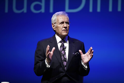 In this Oct. 1, 2018, photo, moderator Alex Trebek speaks during a gubernatorial debate between Democratic Gov. Tom Wolf and Republican Scott Wagner in Hershey, Pa. Jeopardy! host Trebek says he has been diagnosed with advanced -four pancreatic cancer. In a video posted online Wednesday, March 6, 2019, Trebek said he was announcing his illness directly to Jeopardy! fans in keeping with his long-time policy of being open and transparent. (AP Photo/Matt Rourke)