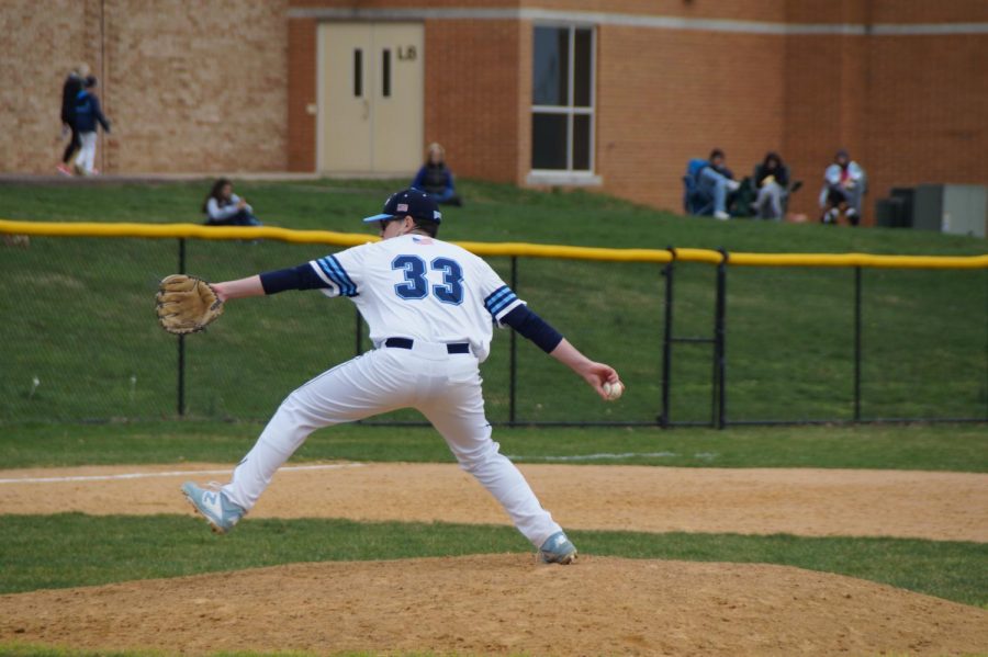 Senior Josh Lowe delivers a pitch as he picked up the win for the Knights.