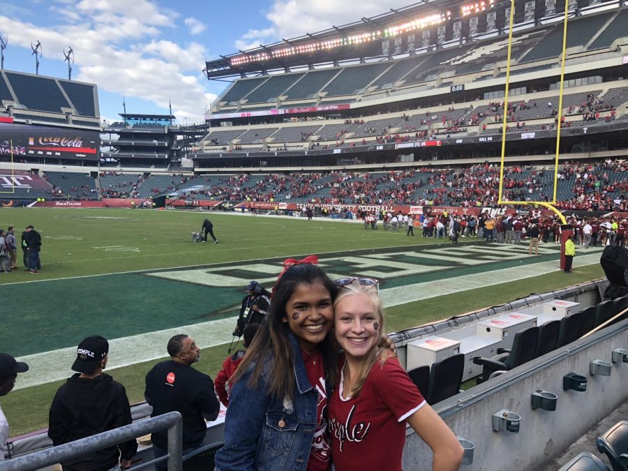 NPHS class of 2018 graduate Nina Raman poses for a picture with her friend Kassandra.