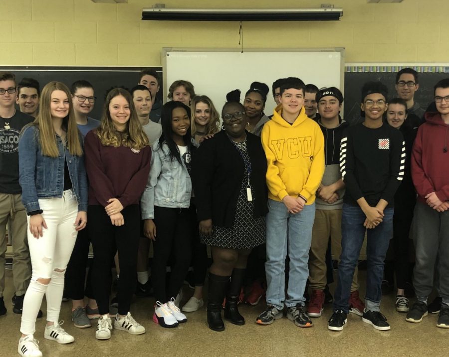 NPHS English teacher Ms. Sakita Tinsely (center) stands with her 1st period class. Tinsley recently received a prestigious honor from the National Liberty Museum.