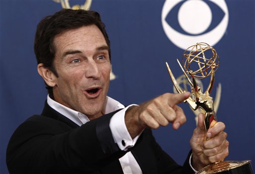 Jeff Probst poses with the award for best host for a reality or reality competition program for Survivor at the 61st Primetime Emmy Awards on Sunday, Sept. 20, 2009, in Los Angeles. (AP Photo/Matt Sayles)